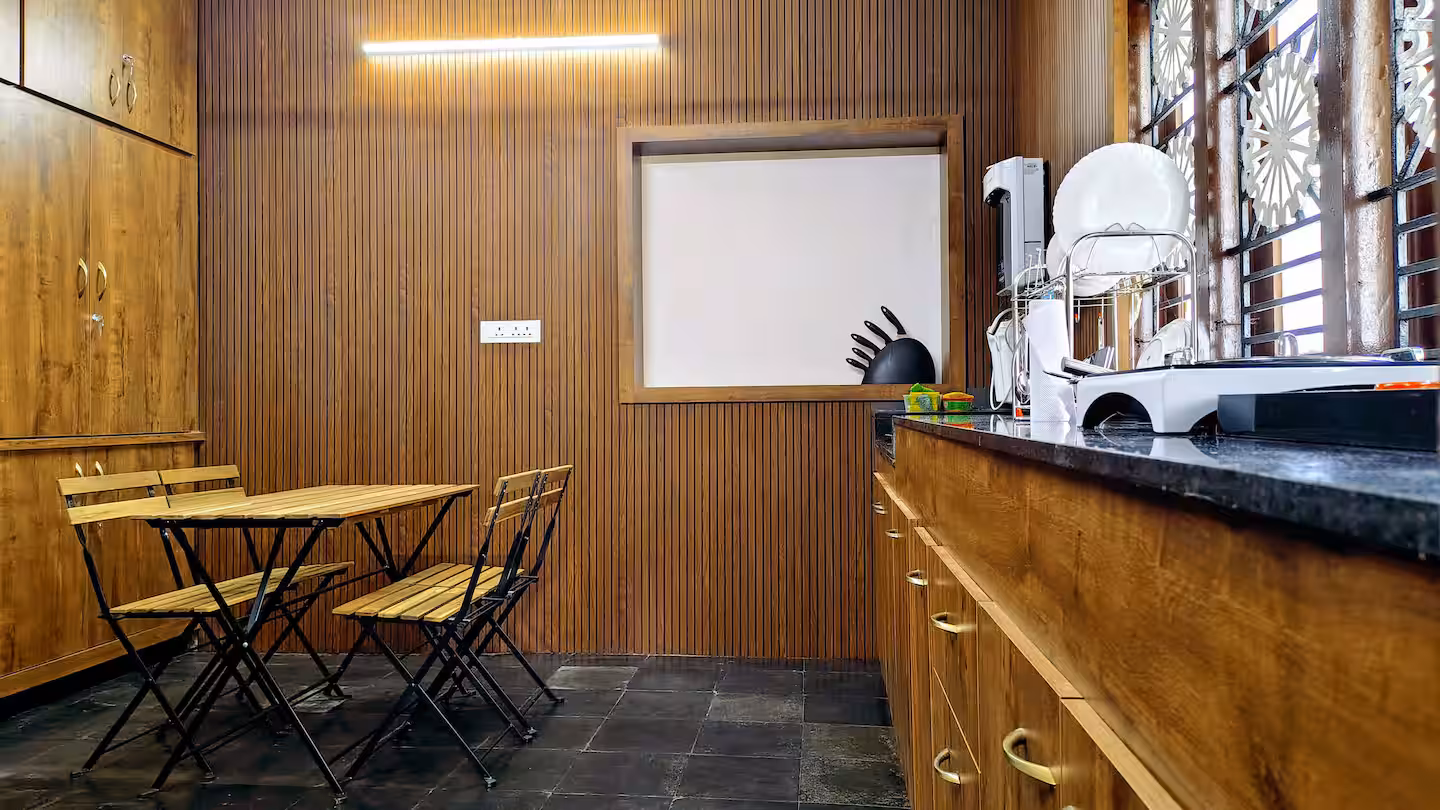 Fully equipped kitchen with premium LG refrigerator and induction stove